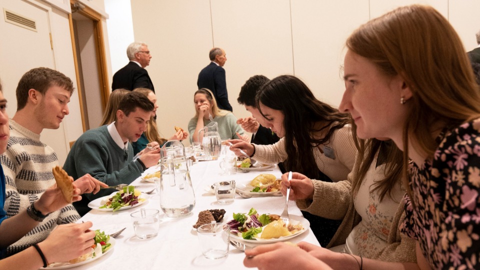 Church members enjoying Lithuanian food in Vilnius, Lithuania on 8 March 2023