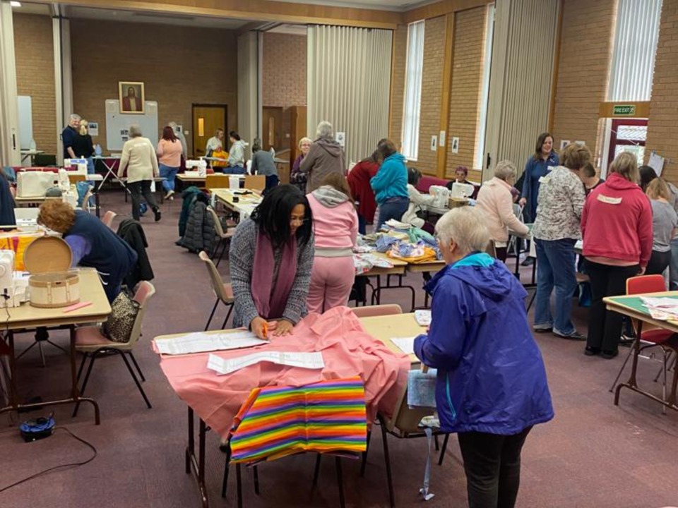 Women prepare clothing